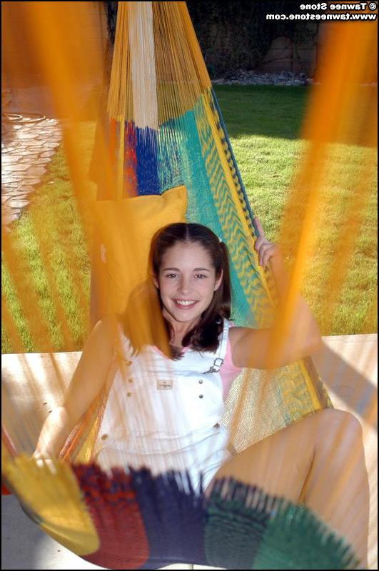 20P Pictures of Tawnee Stone relaxing in the back yard