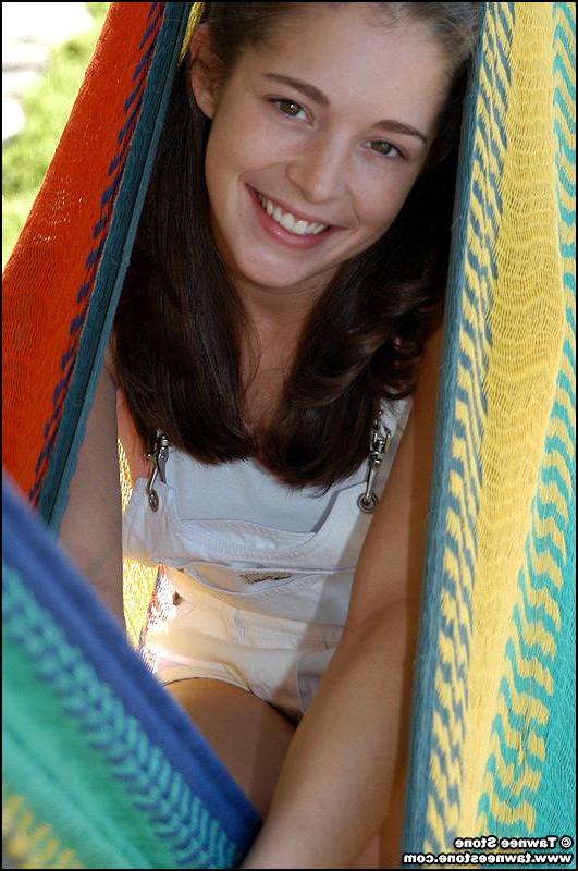 20P Pictures of Tawnee Stone relaxing in the back yard