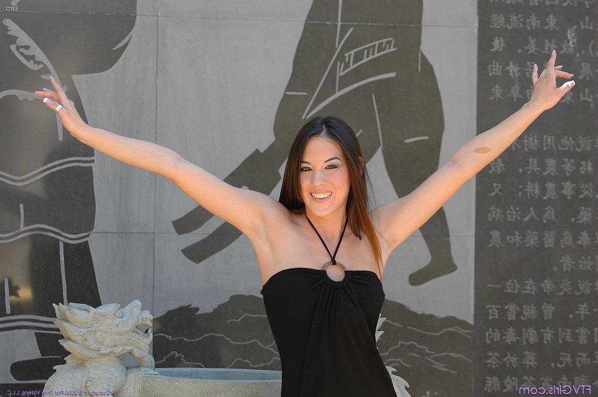 20P Pics of Esra showing some upskirt pussy outside