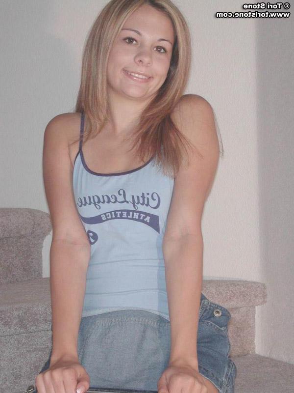 20P Pictures of Tori Stone stripping nude for you