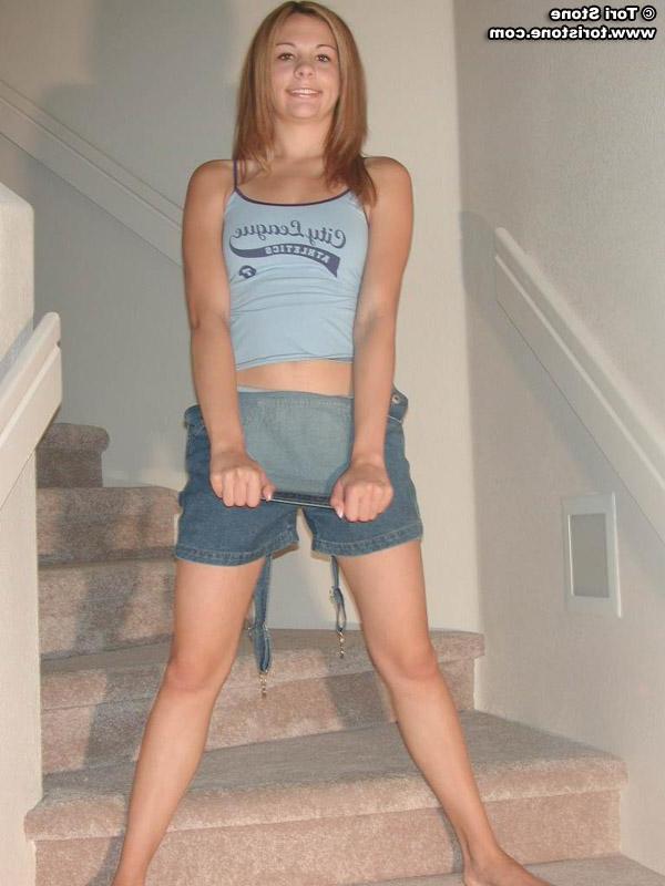 20P Pictures of Tori Stone stripping nude for you