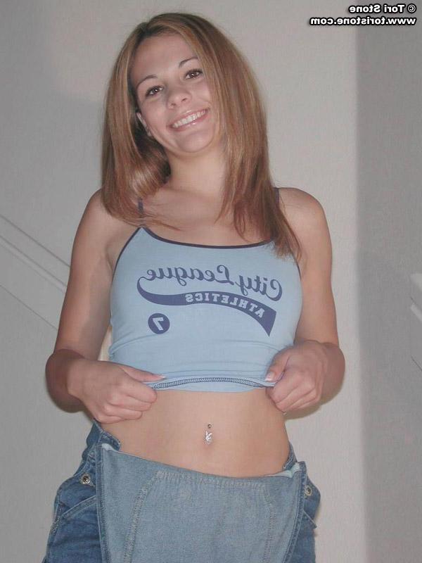 20P Pictures of Tori Stone stripping nude for you