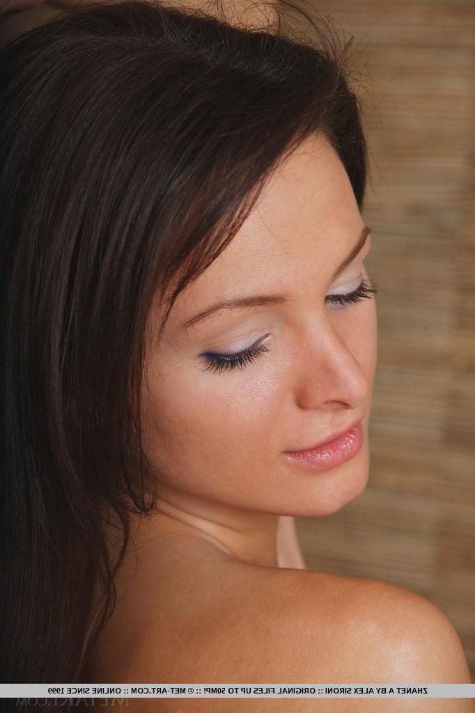 18P Beautiful brunette teen Zhanet A strips nude in bed and waits for you to join in