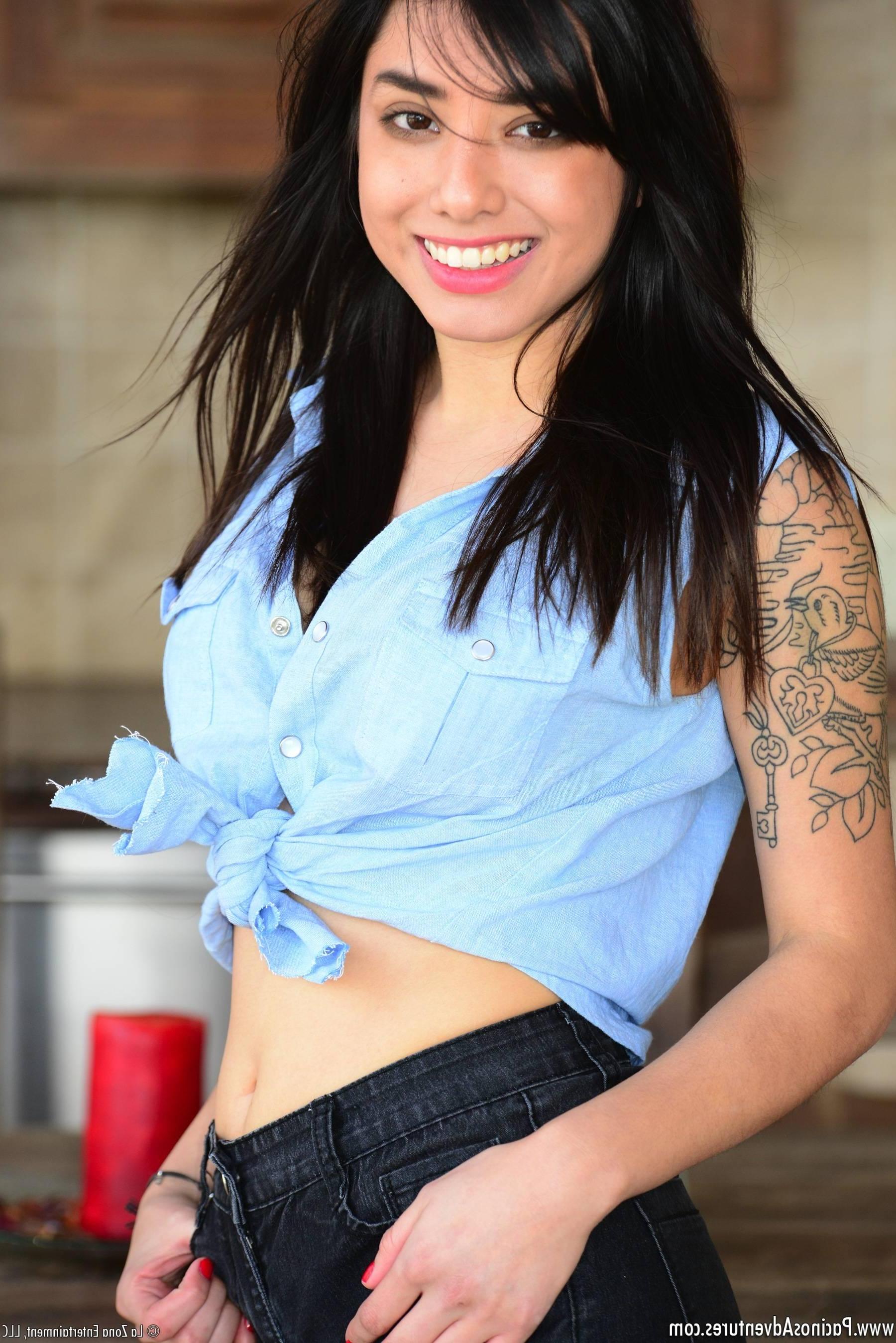 15P Zoe Martinez strips off her short black shorts and denim shirt to reveal her tight teen body