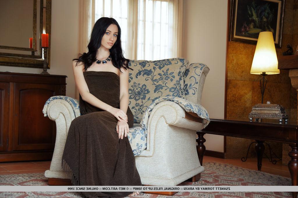 18P Gorgeous teen Zsanett Tormay shows off her tight body as she poses on the sofa