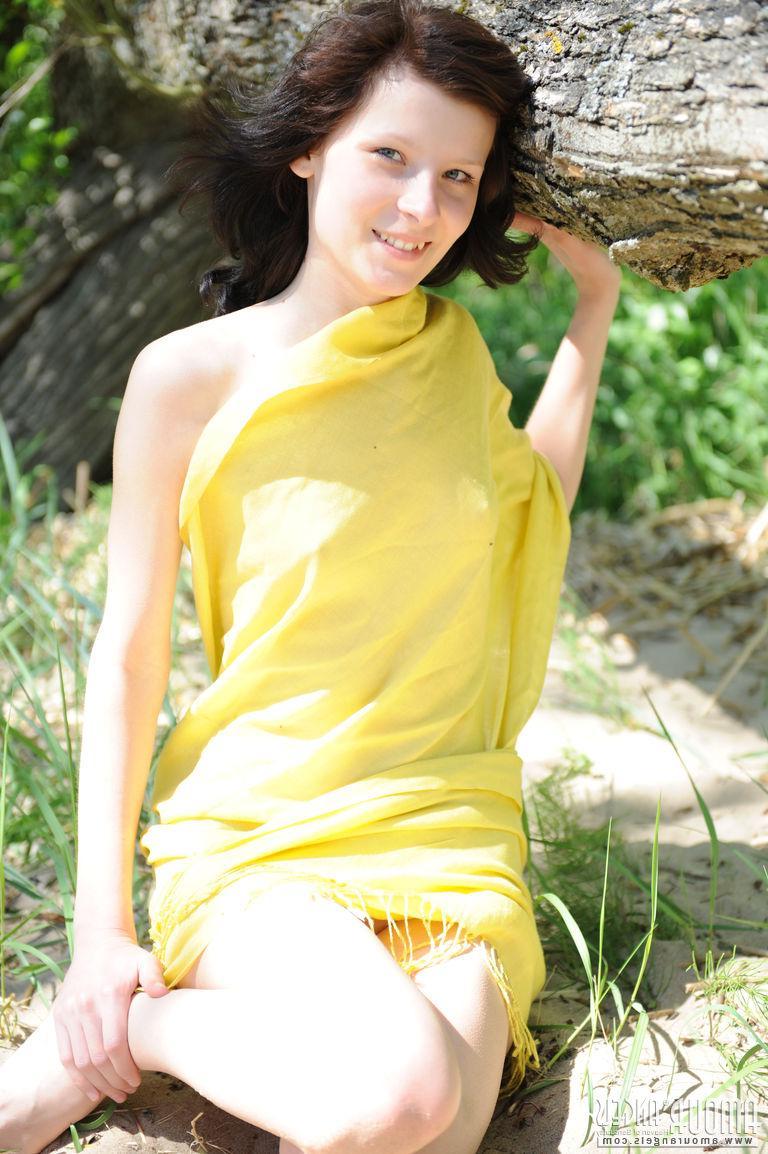 19P Brunette teen Kati strips naked for you in the woods