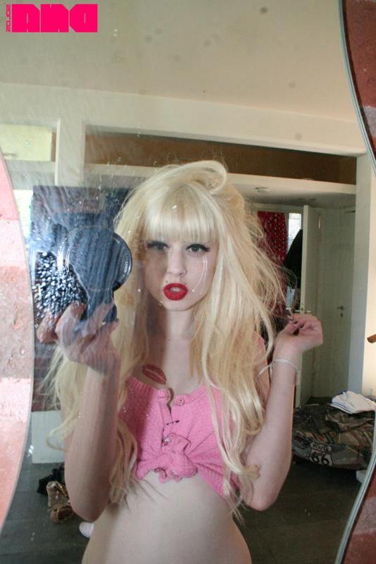 15P Pretty pinup girl Kiss Kim teases with her sexy lips and perky nipples