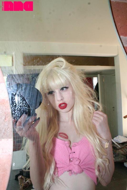15P Pretty pinup girl Kiss Kim teases with her sexy lips and perky nipples