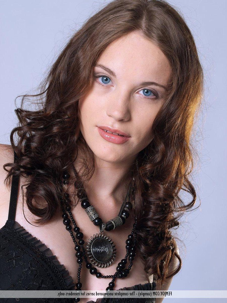 16P Pictures of stunning teen Liana E stripping out of her black lingerie