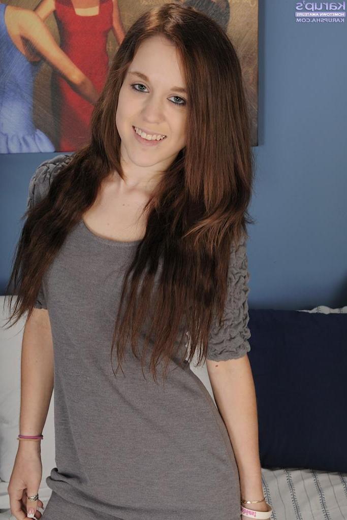 15P Small breasted Trinity Rae strips nude and rubs her sensitive clit