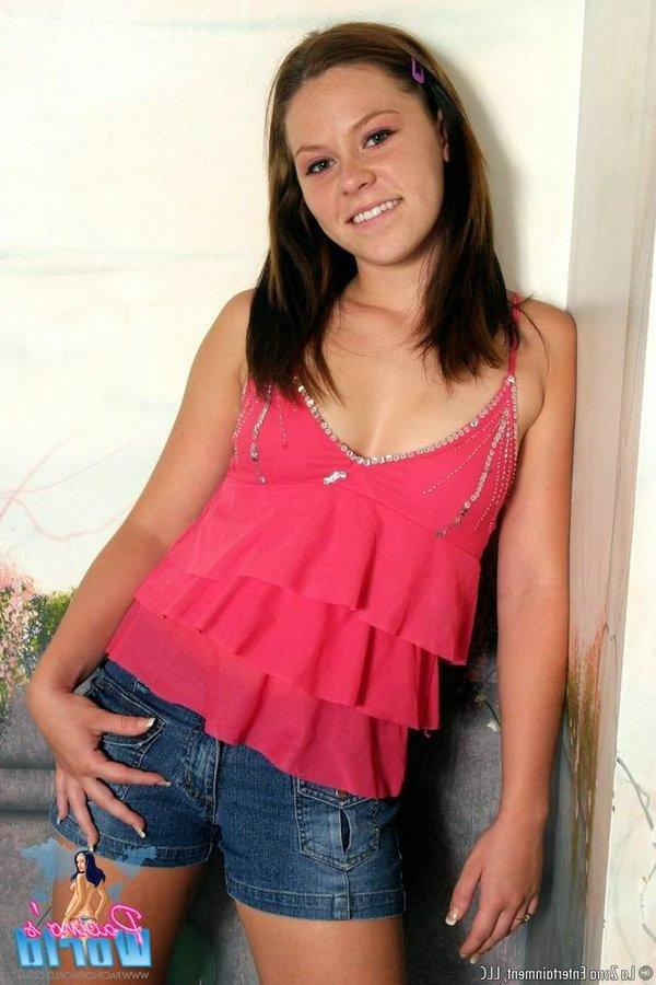 15P Pictures of teen girl Kandie showing off her perky tits and light nipples