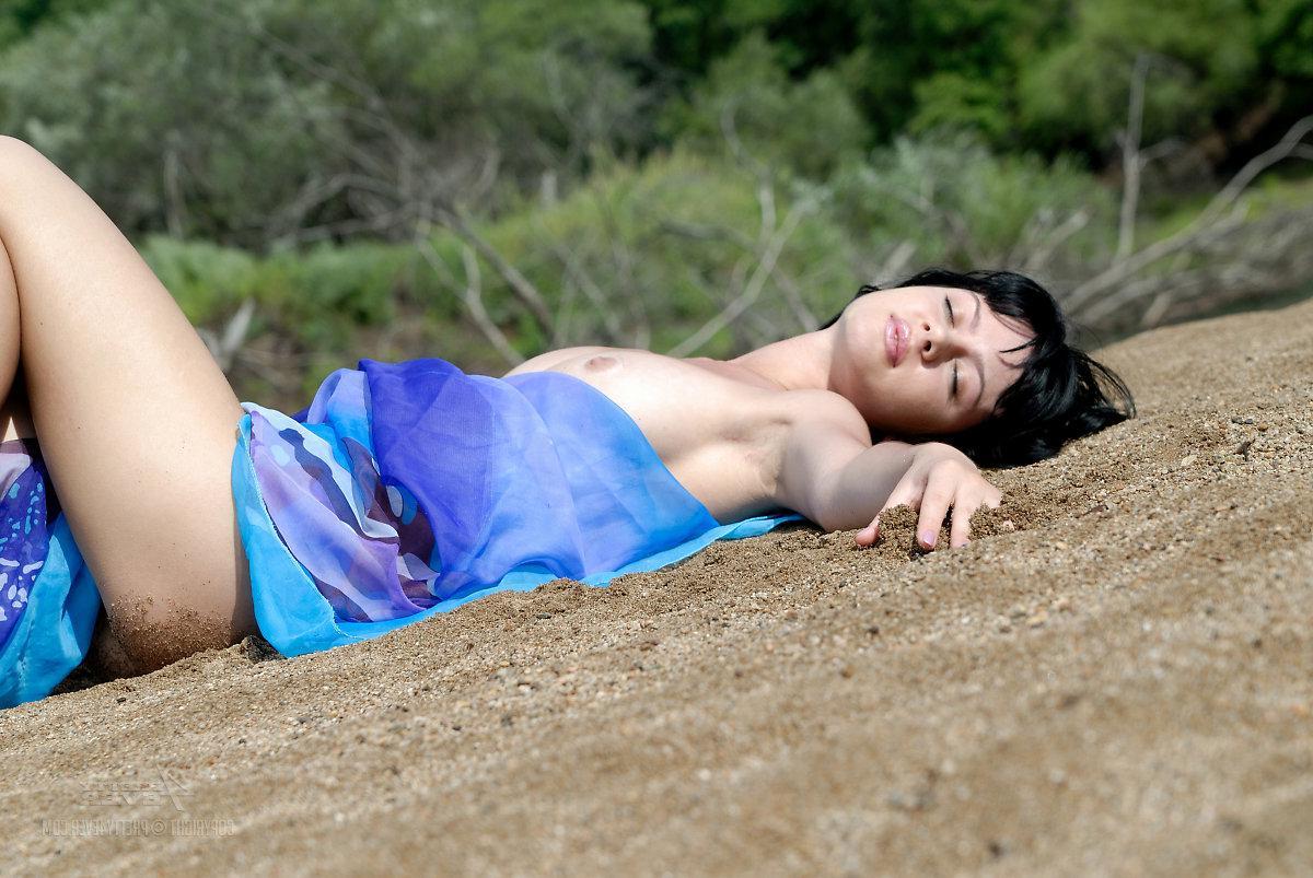 15P Black-haired teen girl Jasmin strips nude outside in "WILD JASMIN"