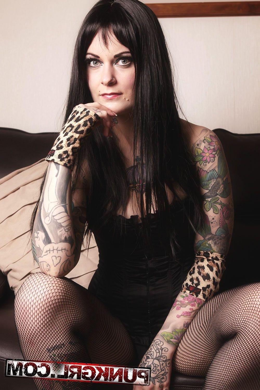 20P Pictures of tattooed chick Ms Propaganda getting nude for you