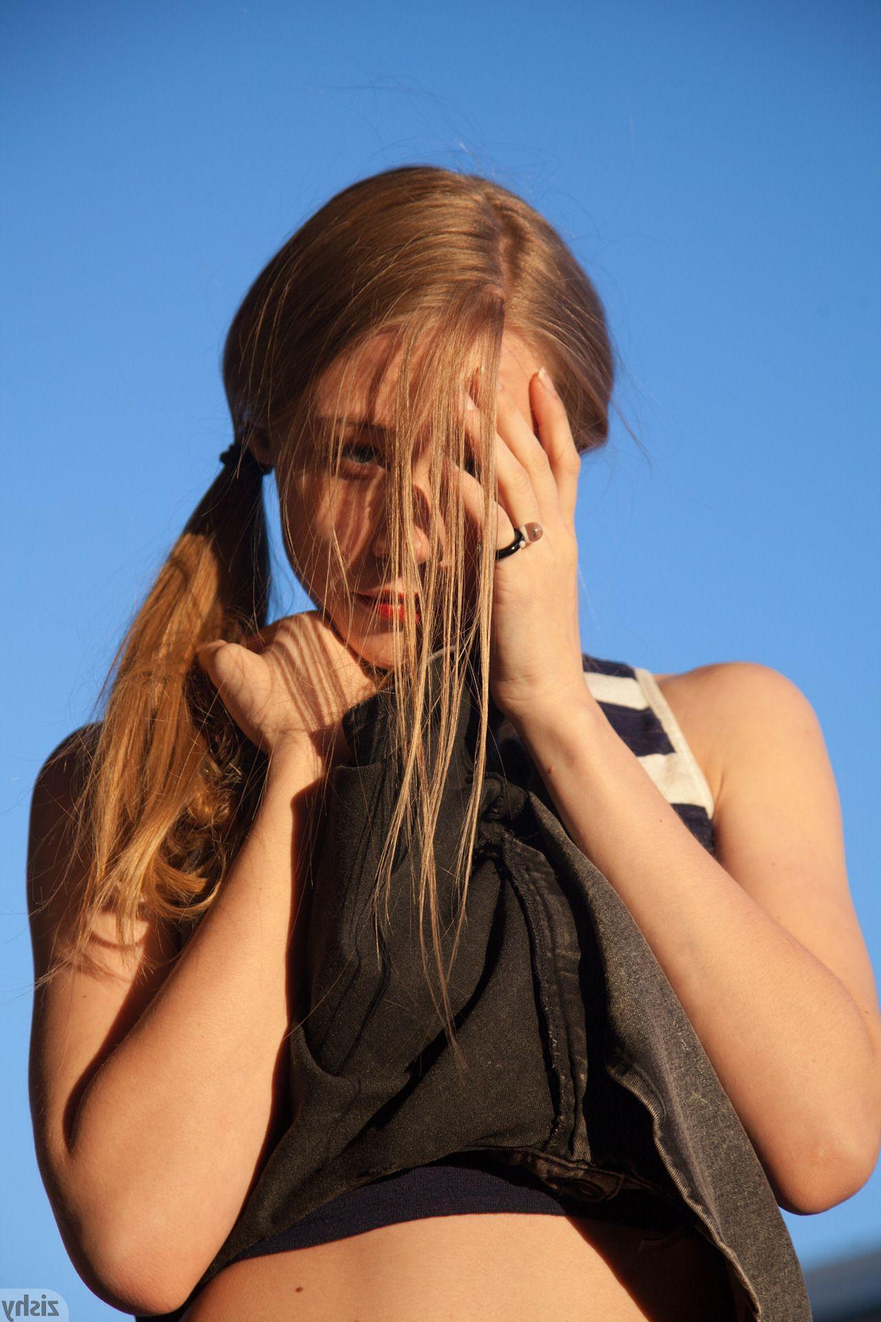 12P Beautiful redhead teen Gloria Paquette has some fun on Mare Island