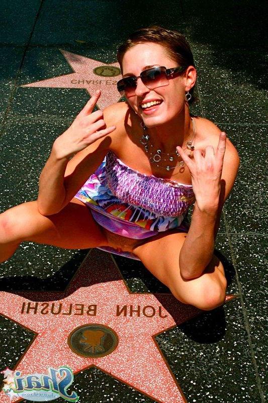 20P Pictures of teen Shai West showing you her pussy upskirt