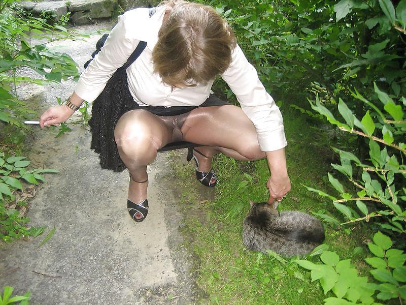 8P My Mrs's Legs  The lady with the cat is my sister-in-law