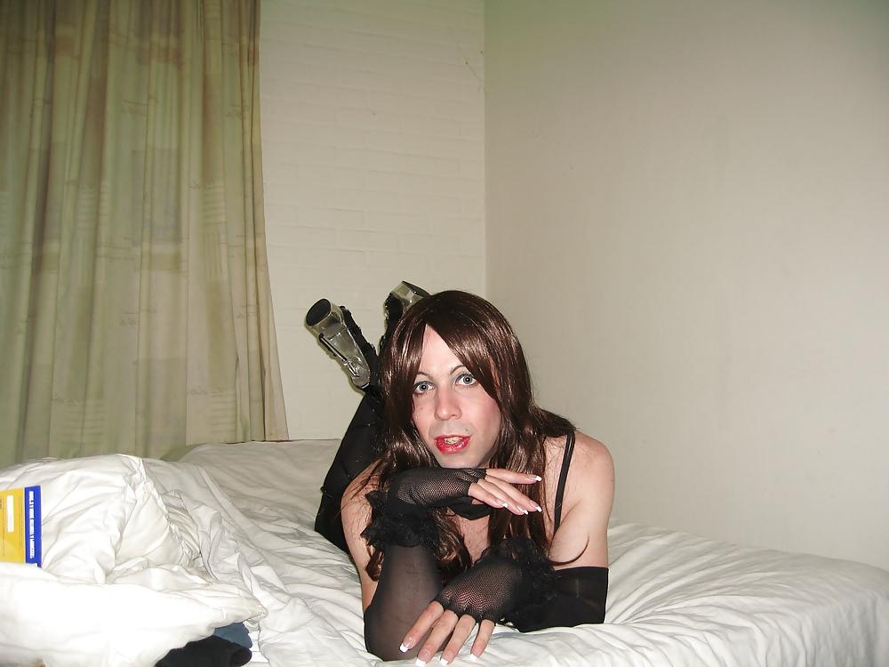 8P Blackn tube dress , long brown hair and killer heels 
