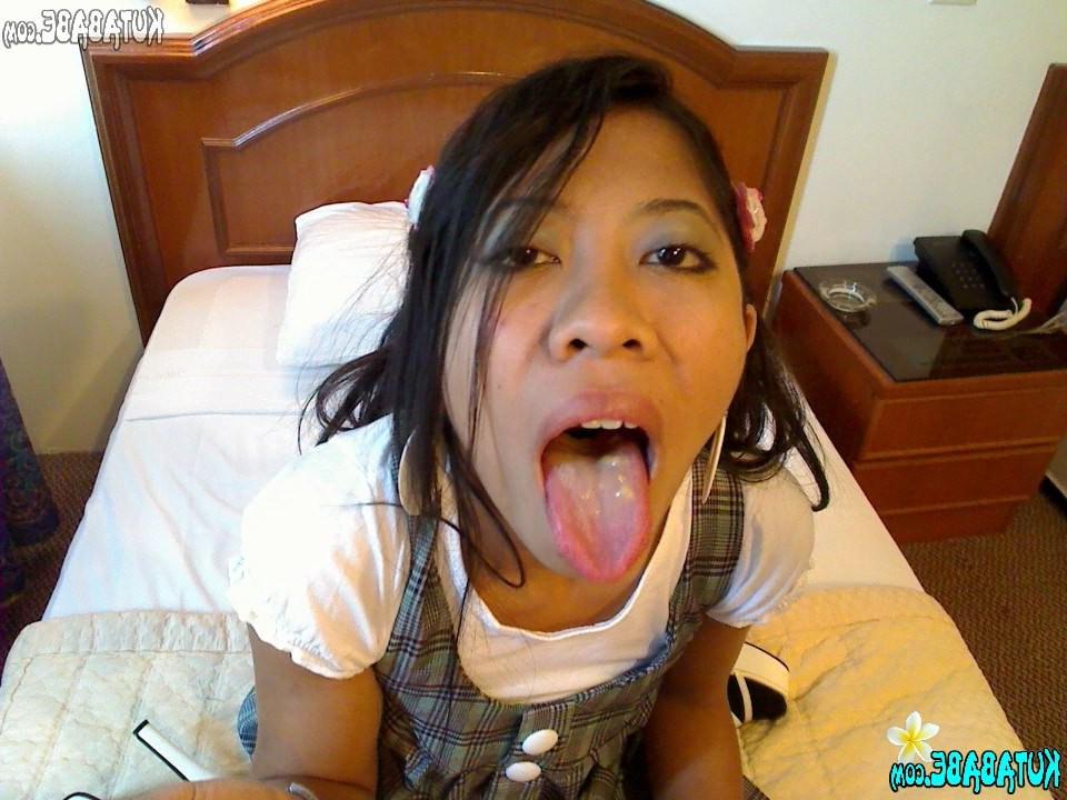 16P Asian Bali teen girl blows banana