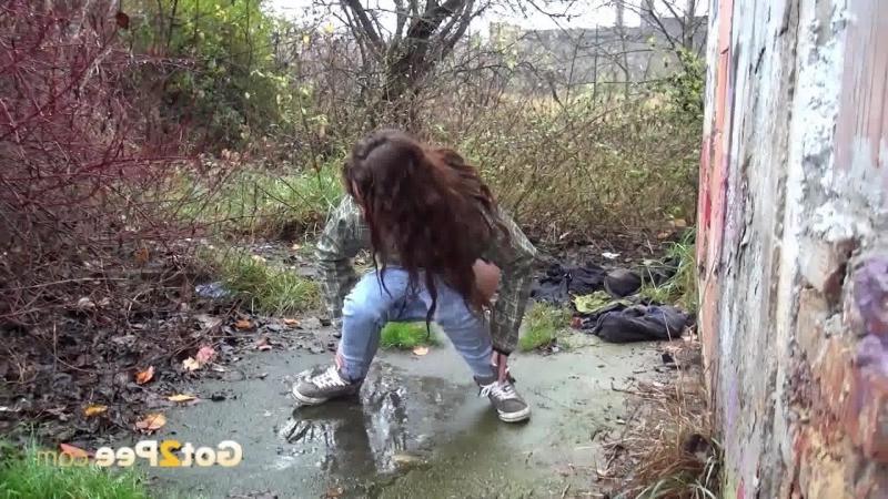 15P Brunette is filmed in a pee fail wetting her panties