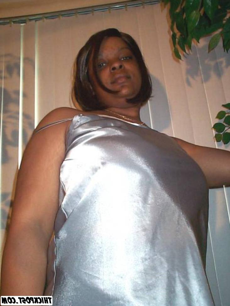 16P Thick ass busty black girl posing
