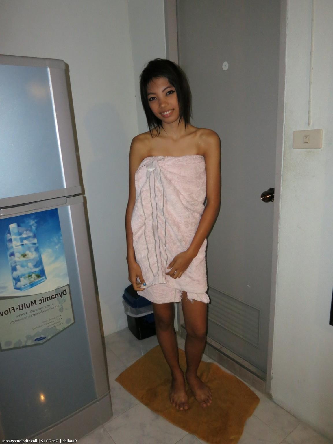 25P Hot Asian Teen street hooker exposing her tight thai booty