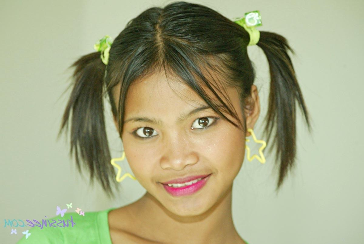 15P Asian Amateur Tussinee in pigtails gets naked