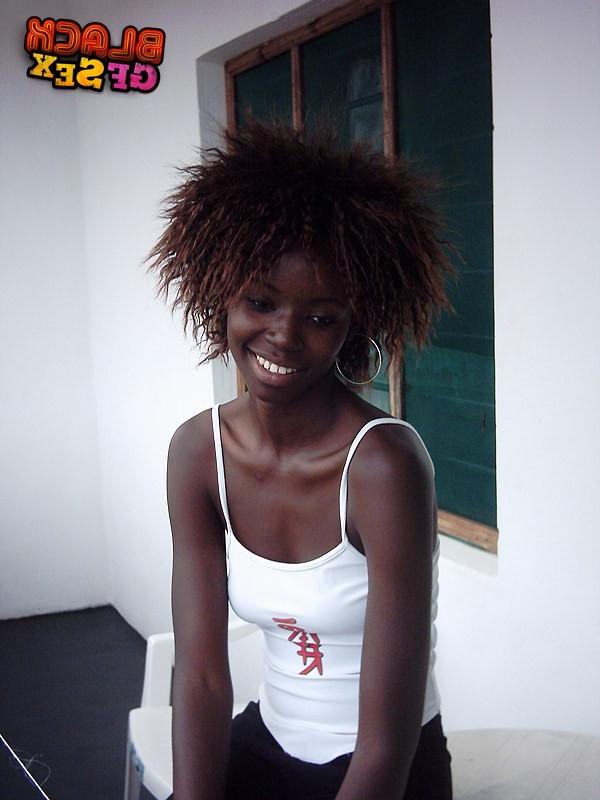 12P Very slim black cutie uncovers the nudity