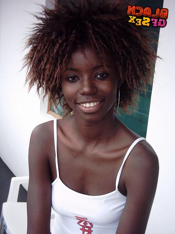 12P Very slim black cutie uncovers the nudity