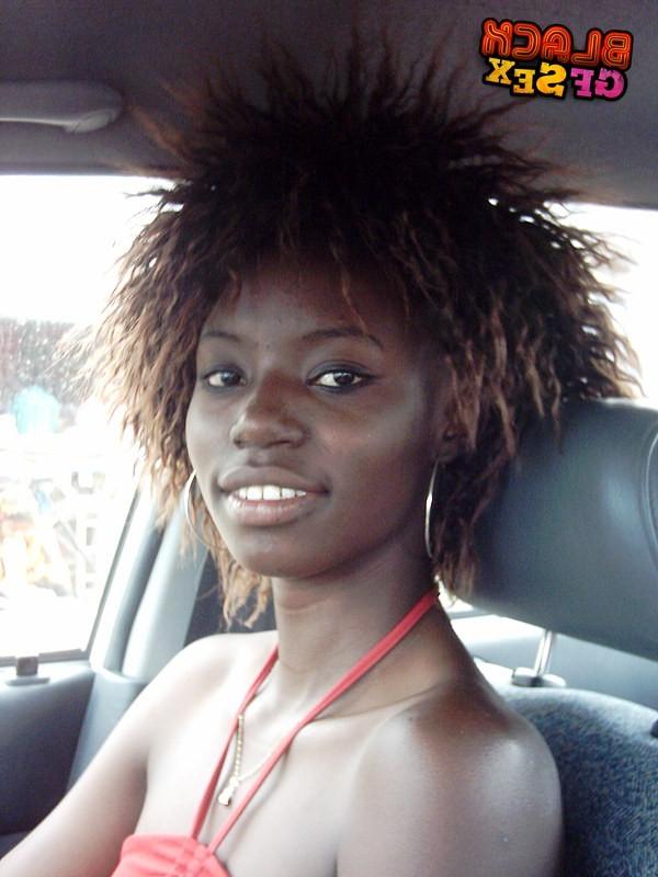 12P Very slim black cutie uncovers the nudity