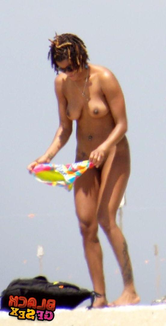 12P Nude black hotties posing and eating cock