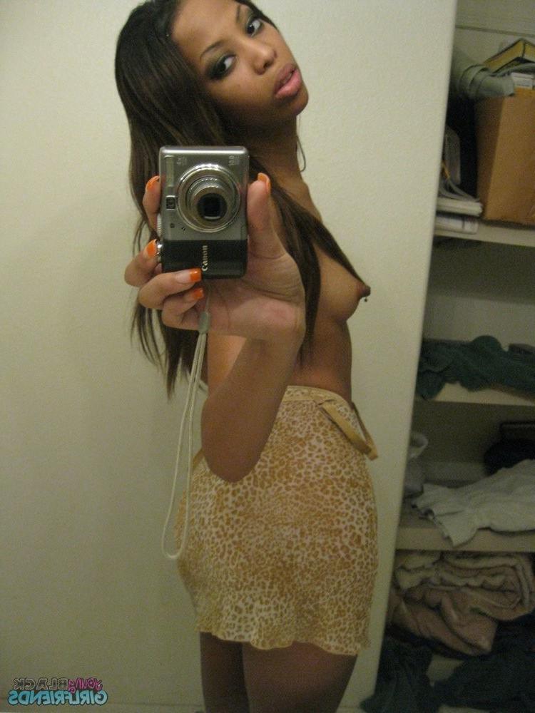 15P Tight black teen showing her naked body 