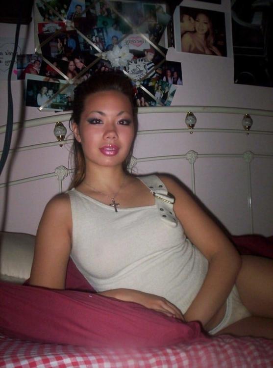 16P Asian cutie slides off her lacey panties for a doggie banging