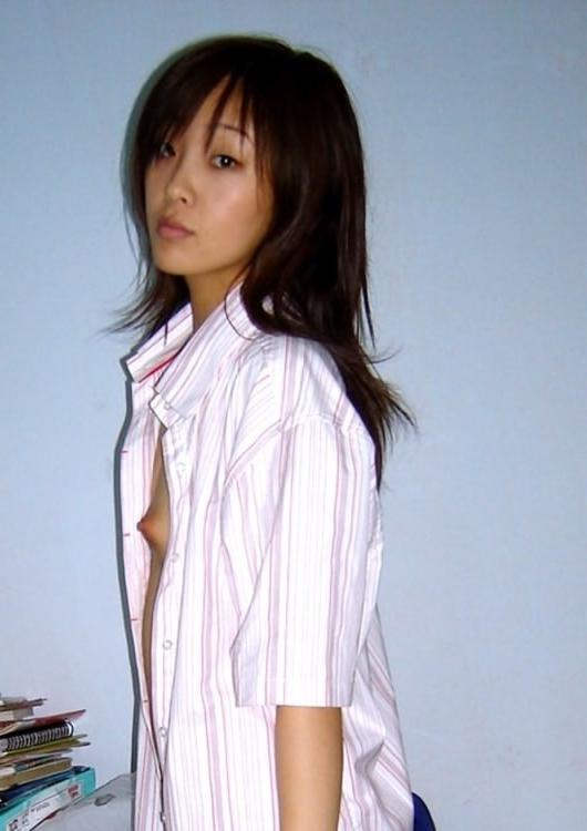 16P Asian cutie slides off her lacey panties for a doggie banging