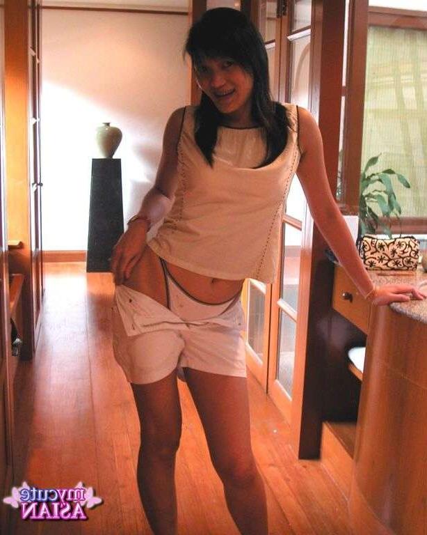 16P Asian amateur poses and spreads her wet pussy