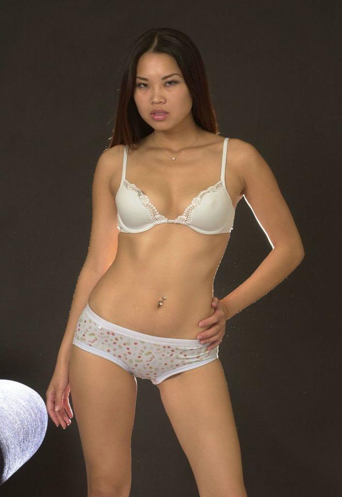 20P Gorgeous asian amateur babe loves strip teasing in lingerie