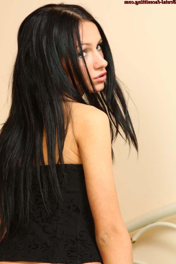 16P Beautiful brunette in black stockings demonstrating her clean-shaven slit