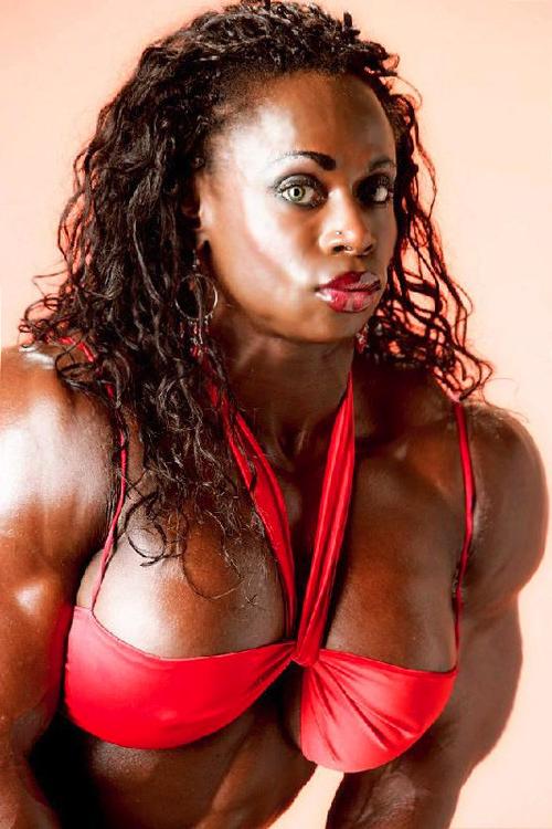 5P Black massive and shredded Female Bodybuilder