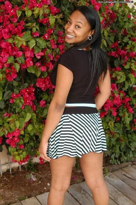 16P Sexy ebony babe gets naked showing tits and ass /