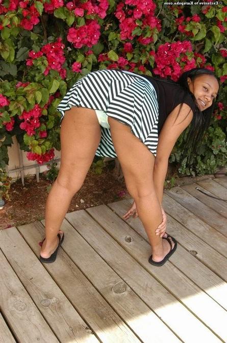 16P Sexy ebony babe gets naked showing tits and ass /