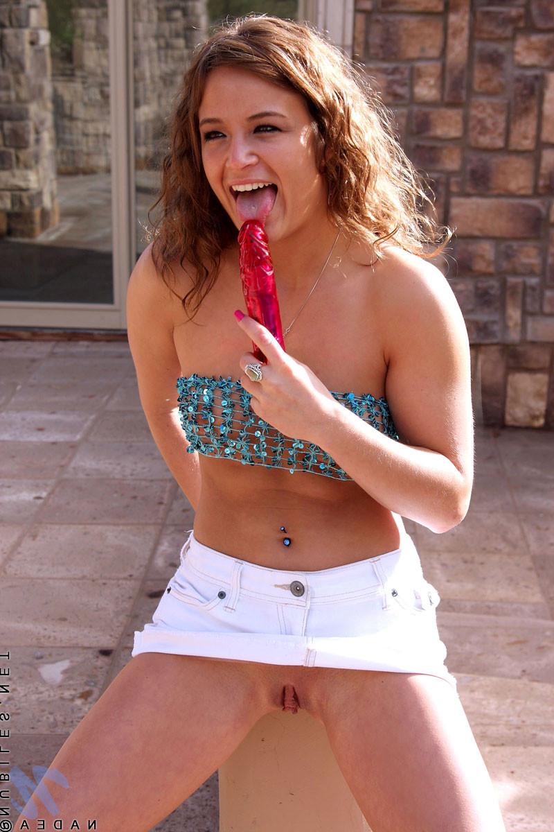 10P Nubile Nadea pushes a vibrator as deep as she can in her tight pussy