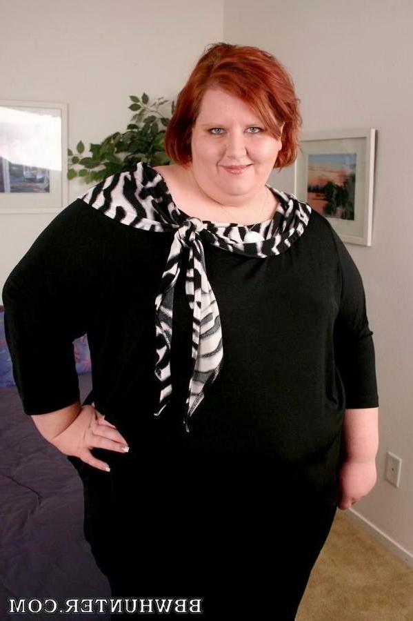 16P Naughty redheaded fatty handling a black dick