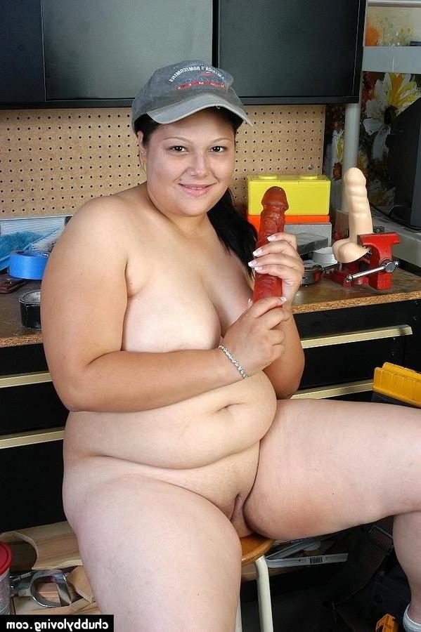 16P Busty BBW Nancy getting nasty in workshop and playing red dildo