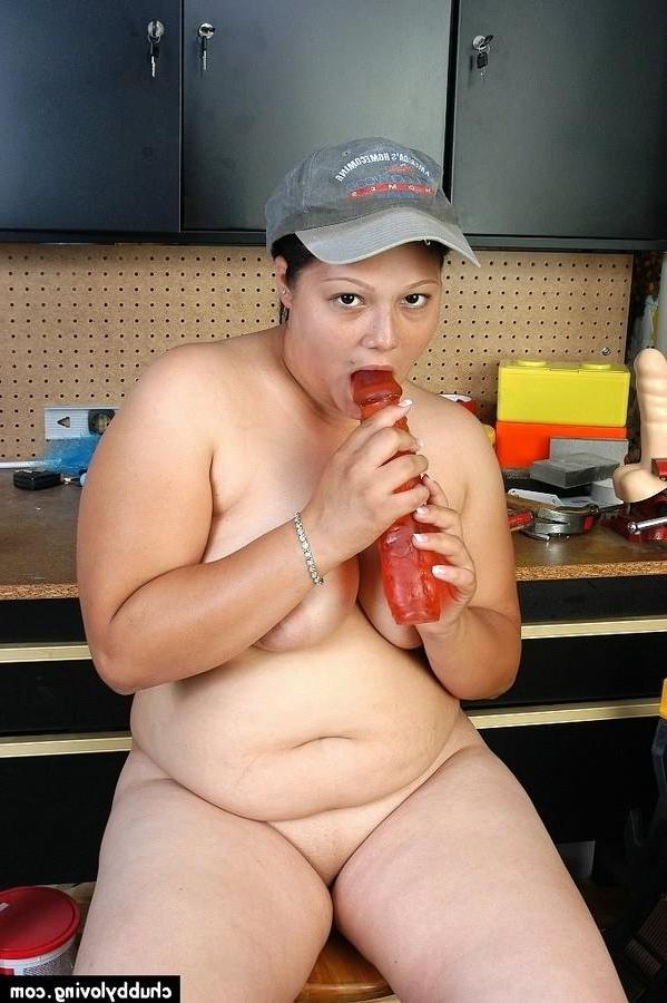 16P Busty BBW Nancy getting nasty in workshop and playing red dildo