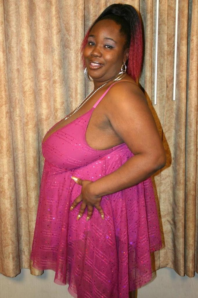 15P Horny ebony bbw loves to tease and posed while playimh with her busty tits