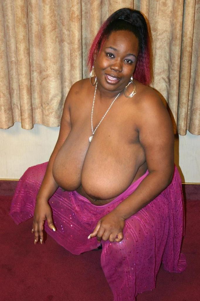 15P Horny ebony bbw loves to tease and posed while playimh with her busty tits
