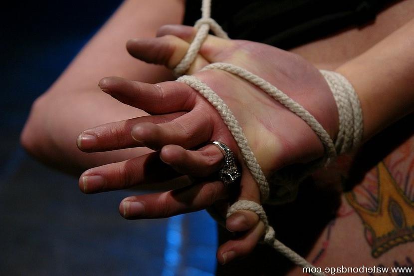 15P Maya Matthews brunette in rope bondage is dunked