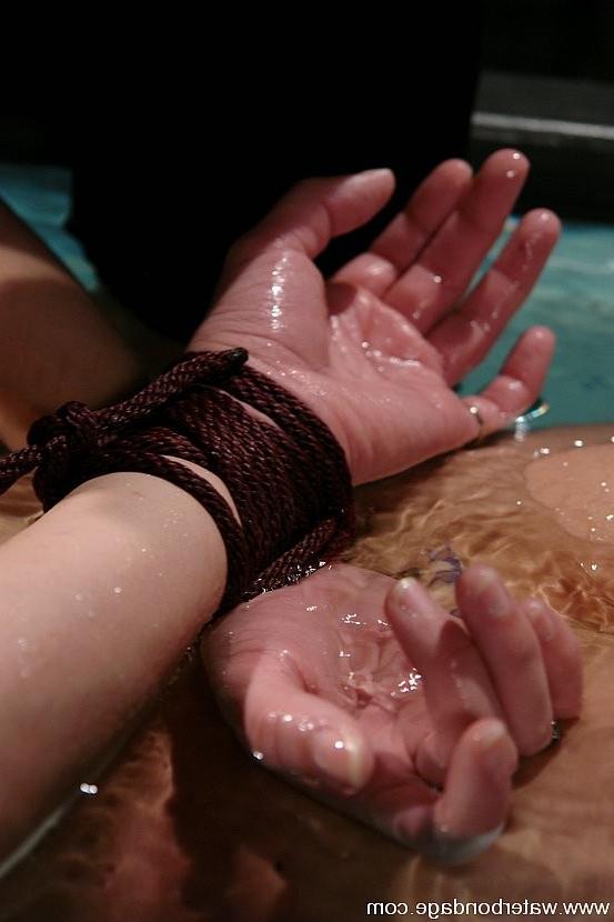 15P Maya Matthews brunette in rope bondage is dunked