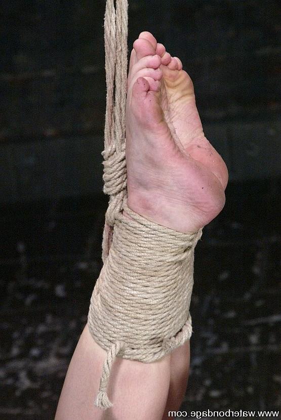 15P Darling busty blonde beauty is rope bound in water
