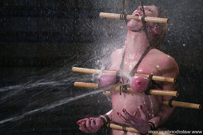 15P Darling busty blonde beauty is rope bound in water