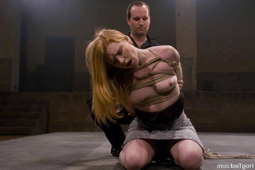15P Busty babe gets tied up with rope